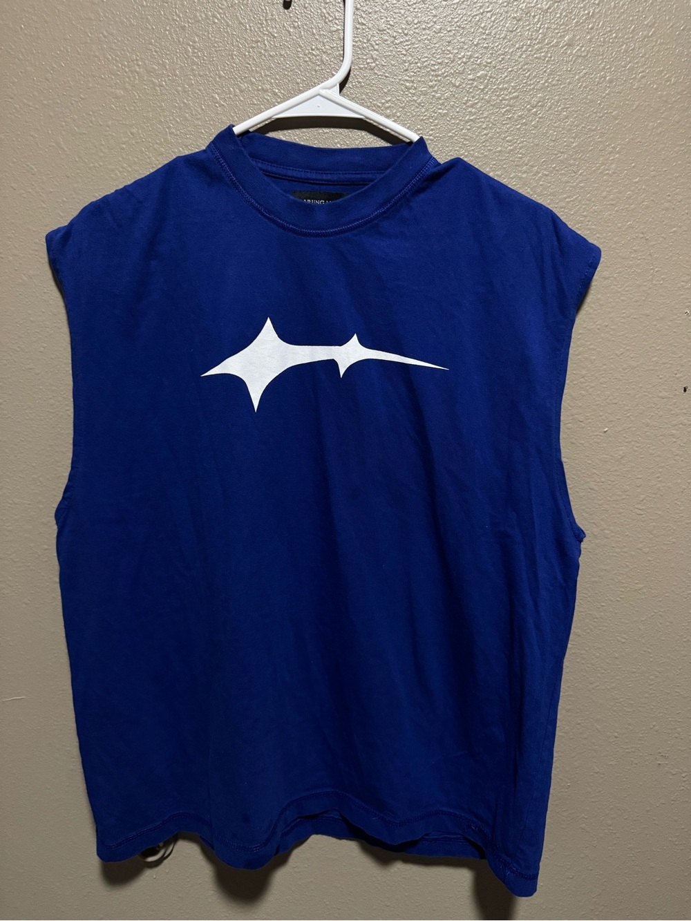 Oversized Blue Sleeveless Tee with White Graphic